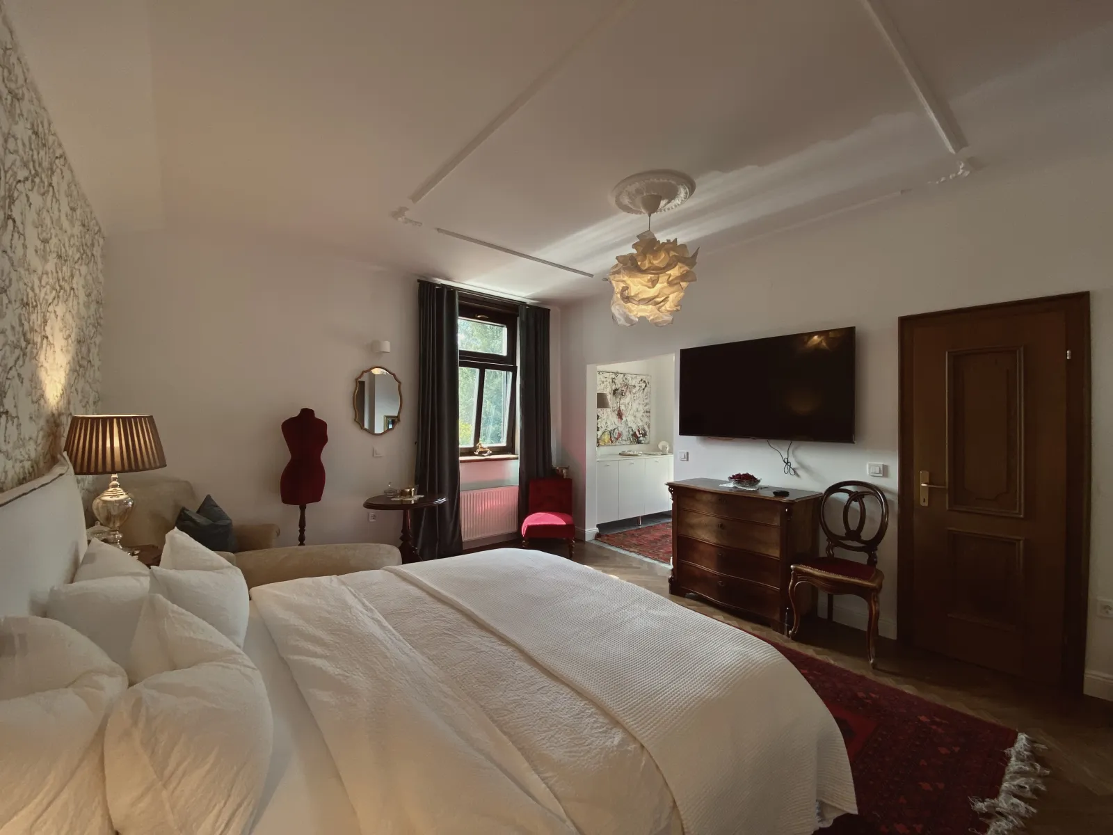 Bedroom 103 — Queen Suite with Pool View